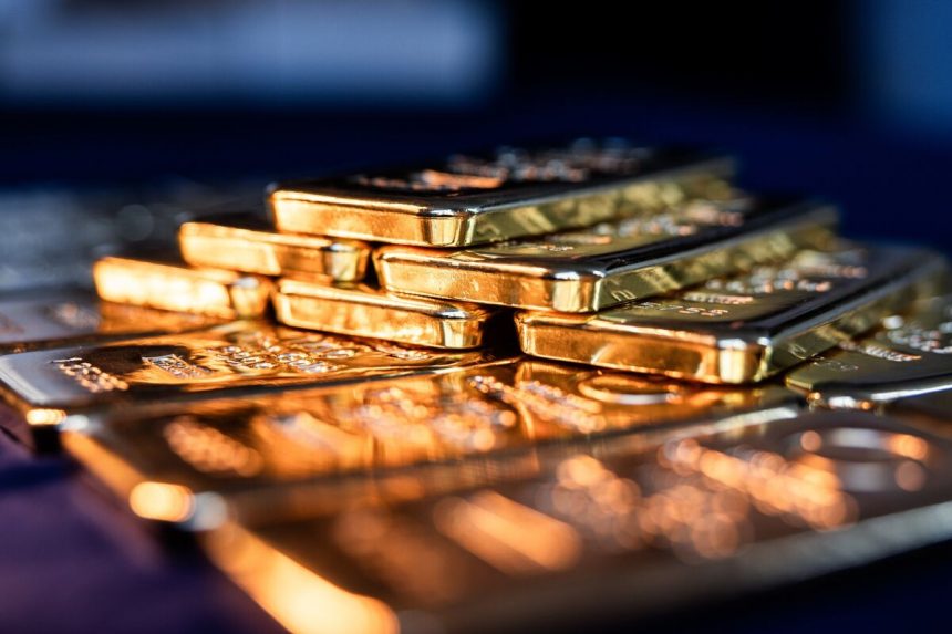 gold-tiene-terreno-cerca-del-record-a-medida-que-los-comerciantes-pesan-el-riesgo-de-cierre
